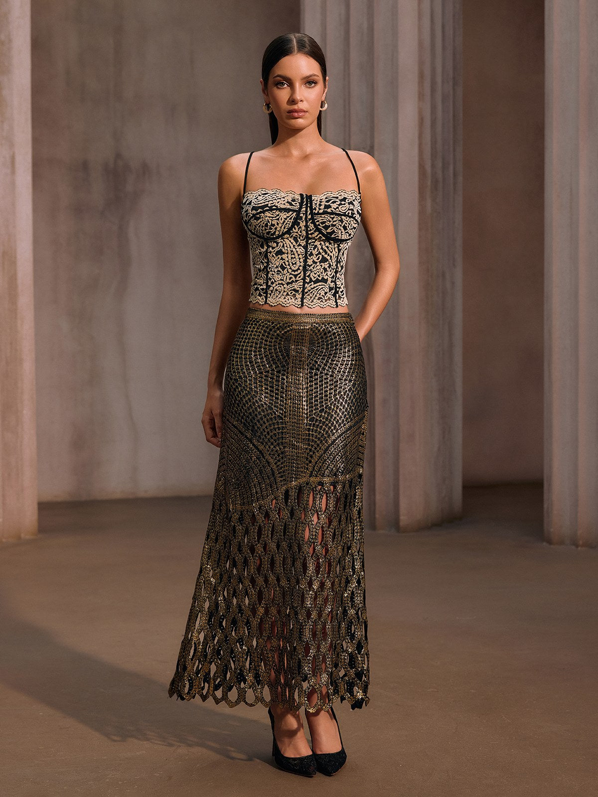 Leldrin Cutout Metallic Skirt In Black & Gold